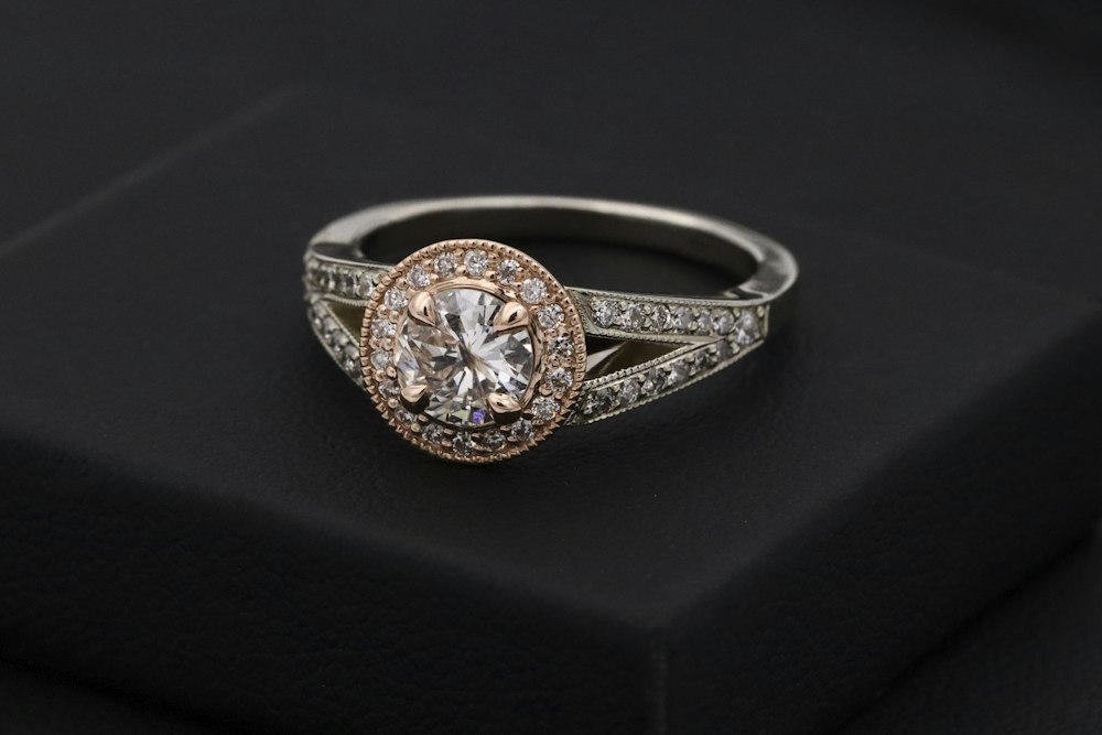 Engagement ring with diamond on hand